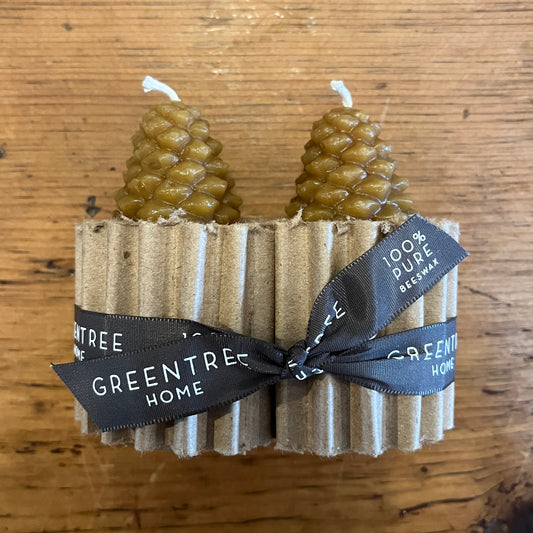 beeswax pine cone candles in burnt amber color wrapped as a set of 2