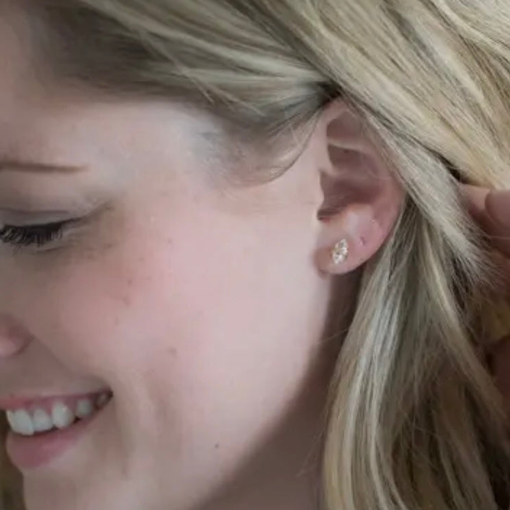 Herkimer diamond stud earrings w/ 14K gold filled posts on woman's ear